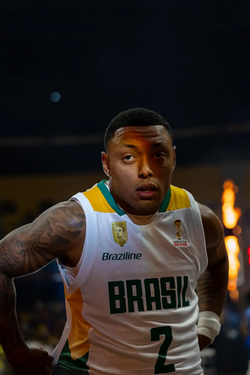 Brazil guard number 2 staring into the lens, arena fire effects behind him