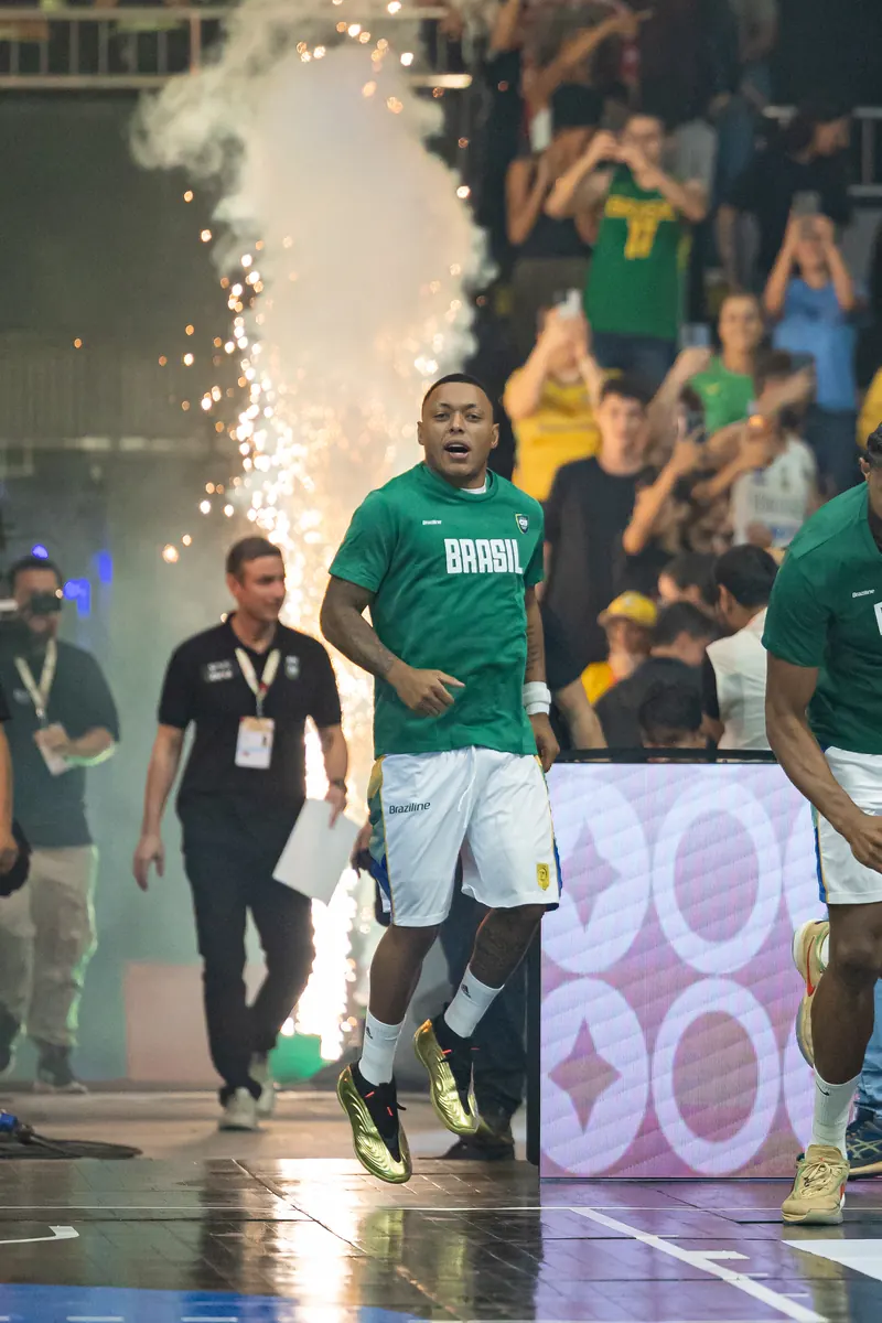 Brazil player running out through pyrotechnics before tip-off
