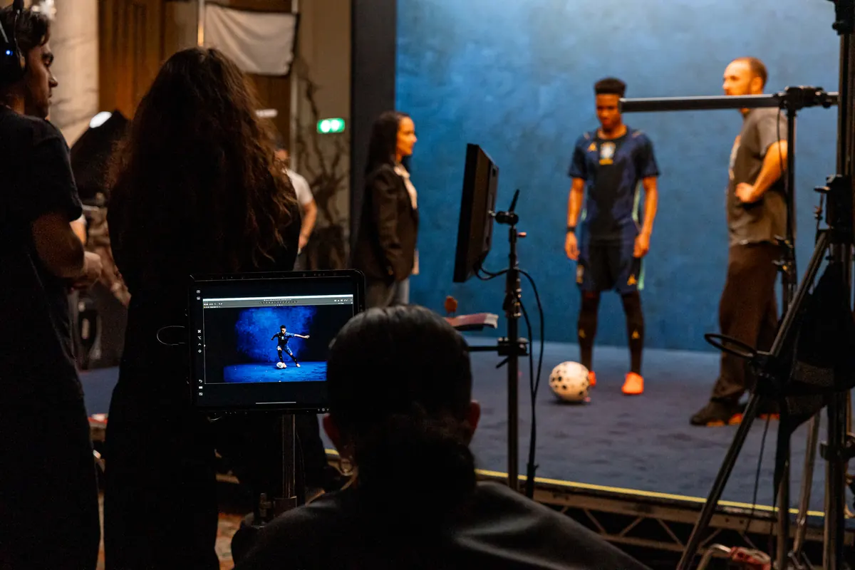 Crew, monitors and talent on the blue Jordan Brand set