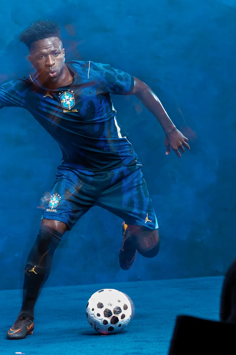 Player in the Jordan Brand Brazil kit attacking a ball on set