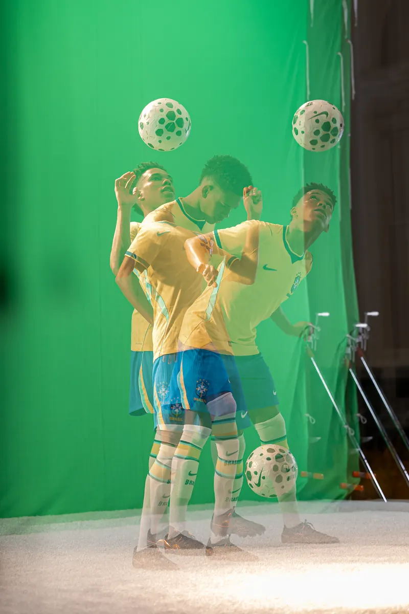 Multiple exposure of a player juggling in front of the green screen