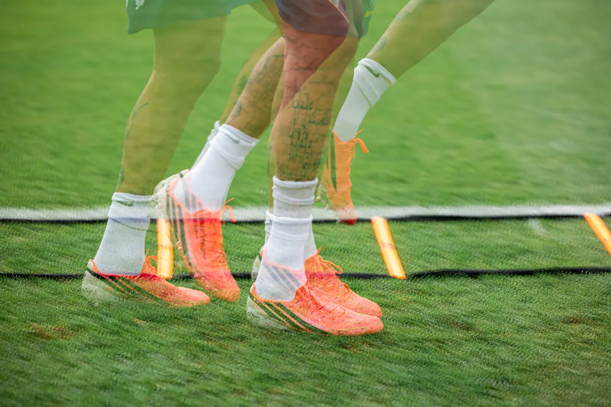 Motion blur of boots through an agility ladder