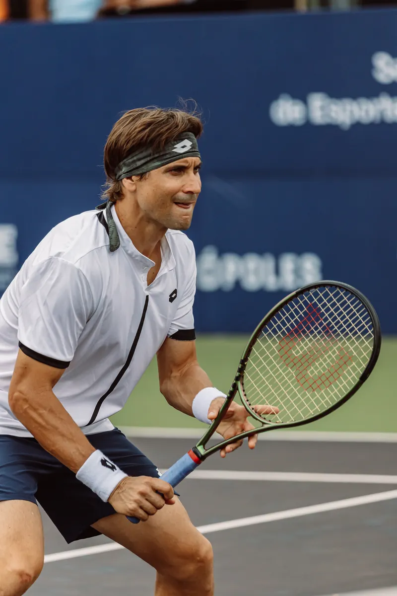 Tennis player ready at the net